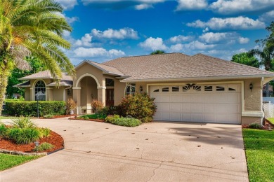 Experience refined Florida living in this meticulously on The Grand Club - Pine Lakes Course in Florida - for sale on GolfHomes.com, golf home, golf lot