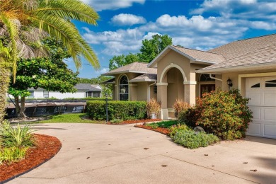 Experience refined Florida living in this meticulously on The Grand Club - Pine Lakes Course in Florida - for sale on GolfHomes.com, golf home, golf lot