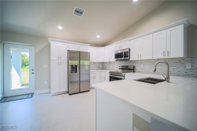 BRAND NEW CONSTRUCTION ON A FRESHWATER CANAL LOT WITH A GREAT on Mirror Lakes Golf Club in Florida - for sale on GolfHomes.com, golf home, golf lot