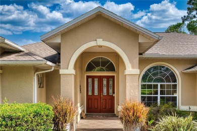 Experience refined Florida living in this meticulously on The Grand Club - Pine Lakes Course in Florida - for sale on GolfHomes.com, golf home, golf lot