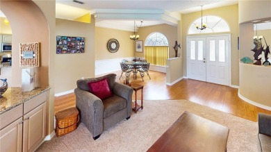 Experience refined Florida living in this meticulously on The Grand Club - Pine Lakes Course in Florida - for sale on GolfHomes.com, golf home, golf lot