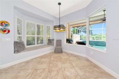 Come see this beautiful well built home with a large open on University Park Country Club in Florida - for sale on GolfHomes.com, golf home, golf lot