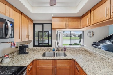 Discover this stunning 2-bedroom, 2-bath 1st-floor corner end on Hideaway Country Club in Florida - for sale on GolfHomes.com, golf home, golf lot
