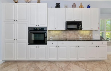 Come see this beautiful well built home with a large open on University Park Country Club in Florida - for sale on GolfHomes.com, golf home, golf lot