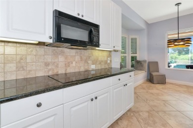 Come see this beautiful well built home with a large open on University Park Country Club in Florida - for sale on GolfHomes.com, golf home, golf lot