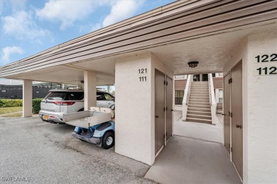 Discover this stunning 2-bedroom, 2-bath 1st-floor corner end on Hideaway Country Club in Florida - for sale on GolfHomes.com, golf home, golf lot