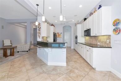 Come see this beautiful well built home with a large open on University Park Country Club in Florida - for sale on GolfHomes.com, golf home, golf lot