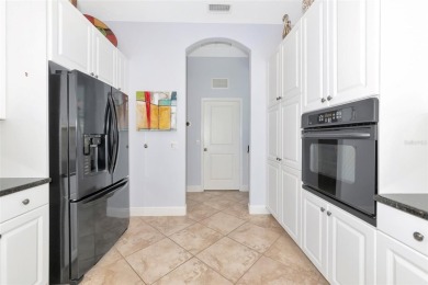 Come see this beautiful well built home with a large open on University Park Country Club in Florida - for sale on GolfHomes.com, golf home, golf lot