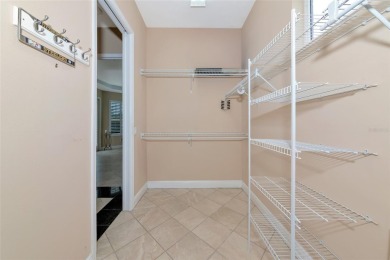 Come see this beautiful well built home with a large open on University Park Country Club in Florida - for sale on GolfHomes.com, golf home, golf lot