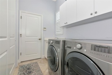Come see this beautiful well built home with a large open on University Park Country Club in Florida - for sale on GolfHomes.com, golf home, golf lot