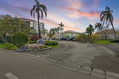 Under contract-accepting backup offers. Beautiful water views on Isla Del Sol Yacht and Country Club in Florida - for sale on GolfHomes.com, golf home, golf lot