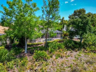 Come see this beautiful well built home with a large open on University Park Country Club in Florida - for sale on GolfHomes.com, golf home, golf lot