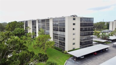 Discover stylish comfort in this beautiful 2-bedroom, 2-bathroom on Cove Cay Country Club in Florida - for sale on GolfHomes.com, golf home, golf lot