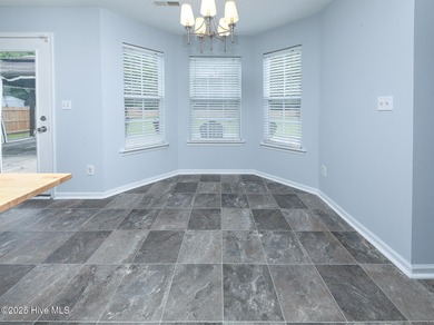 Welcome to this beautiful two- story 4 bedroom 2.5 bathroom home on Eagle Creek Golf Club and Grill in North Carolina - for sale on GolfHomes.com, golf home, golf lot