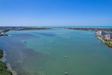 Under contract-accepting backup offers. Beautiful water views on Isla Del Sol Yacht and Country Club in Florida - for sale on GolfHomes.com, golf home, golf lot