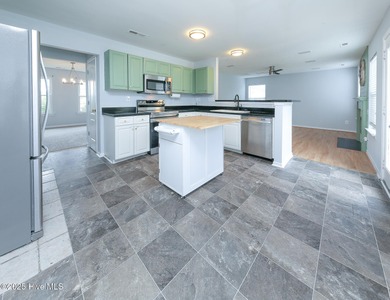 Welcome to this beautiful two- story 4 bedroom 2.5 bathroom home on Eagle Creek Golf Club and Grill in North Carolina - for sale on GolfHomes.com, golf home, golf lot