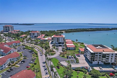 Under contract-accepting backup offers. Beautiful water views on Isla Del Sol Yacht and Country Club in Florida - for sale on GolfHomes.com, golf home, golf lot
