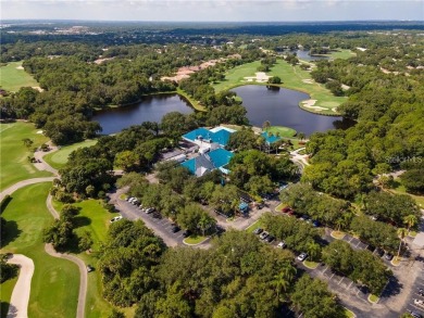 Come see this beautiful well built home with a large open on University Park Country Club in Florida - for sale on GolfHomes.com, golf home, golf lot