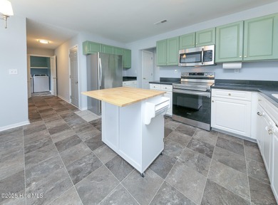 Welcome to this beautiful two- story 4 bedroom 2.5 bathroom home on Eagle Creek Golf Club and Grill in North Carolina - for sale on GolfHomes.com, golf home, golf lot