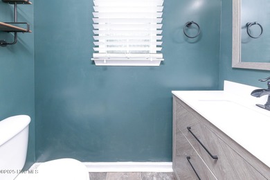 Welcome to this beautiful two- story 4 bedroom 2.5 bathroom home on Eagle Creek Golf Club and Grill in North Carolina - for sale on GolfHomes.com, golf home, golf lot