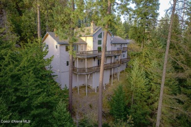 As you step outside, the serene lake surroundings take center on Ponderosa Springs Golf Course in Idaho - for sale on GolfHomes.com, golf home, golf lot