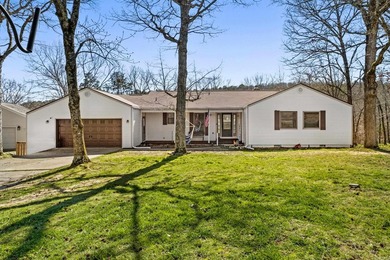 Your lake home awaits! This well-maintained home is situated on on Indian Hills Country Club in Arkansas - for sale on GolfHomes.com, golf home, golf lot