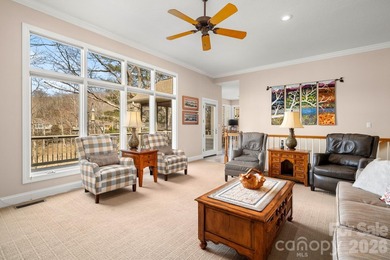 Perched on a gentle hill with sweeping views of the 7th and 9th on Cummings Cove Golf and Country Club in North Carolina - for sale on GolfHomes.com, golf home, golf lot