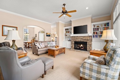 Perched on a gentle hill with sweeping views of the 7th and 9th on Cummings Cove Golf and Country Club in North Carolina - for sale on GolfHomes.com, golf home, golf lot