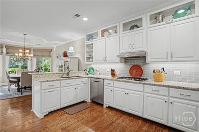 Gorgeous double lagoon and golf course view patio home in on The Landings Club - Oakridge in Georgia - for sale on GolfHomes.com, golf home, golf lot