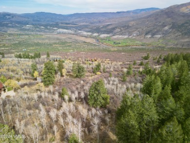 Touted as one of the best view lots in the Travis Creek on Red Sky Ranch and Golf Club in Colorado - for sale on GolfHomes.com, golf home, golf lot