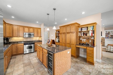 Perched on a gentle hill with sweeping views of the 7th and 9th on Cummings Cove Golf and Country Club in North Carolina - for sale on GolfHomes.com, golf home, golf lot