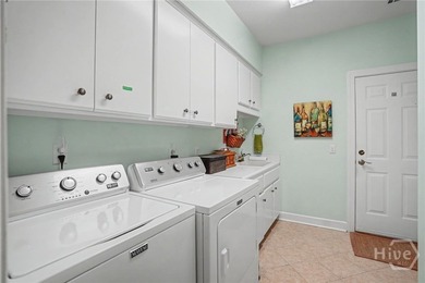 Gorgeous double lagoon and golf course view patio home in on The Landings Club - Oakridge in Georgia - for sale on GolfHomes.com, golf home, golf lot