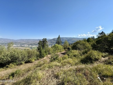 Touted as one of the best view lots in the Travis Creek on Red Sky Ranch and Golf Club in Colorado - for sale on GolfHomes.com, golf home, golf lot