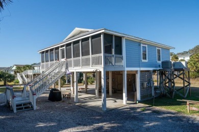 Meticulously maintained Edisto cottage fronting on a saltwater on The Plantation Course At Edisto in South Carolina - for sale on GolfHomes.com, golf home, golf lot