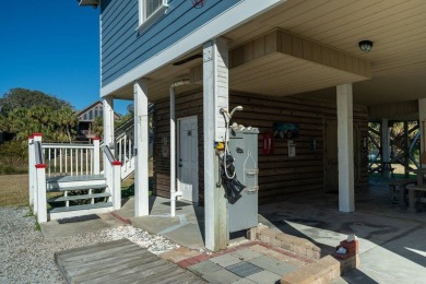 Meticulously maintained Edisto cottage fronting on a saltwater on The Plantation Course At Edisto in South Carolina - for sale on GolfHomes.com, golf home, golf lot