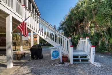 Meticulously maintained Edisto cottage fronting on a saltwater on The Plantation Course At Edisto in South Carolina - for sale on GolfHomes.com, golf home, golf lot