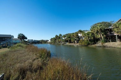 Meticulously maintained Edisto cottage fronting on a saltwater on The Plantation Course At Edisto in South Carolina - for sale on GolfHomes.com, golf home, golf lot