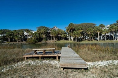 Meticulously maintained Edisto cottage fronting on a saltwater on The Plantation Course At Edisto in South Carolina - for sale on GolfHomes.com, golf home, golf lot