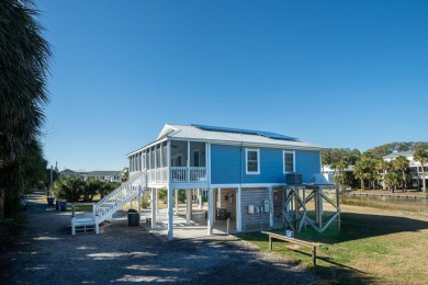 Meticulously maintained Edisto cottage fronting on a saltwater on The Plantation Course At Edisto in South Carolina - for sale on GolfHomes.com, golf home, golf lot