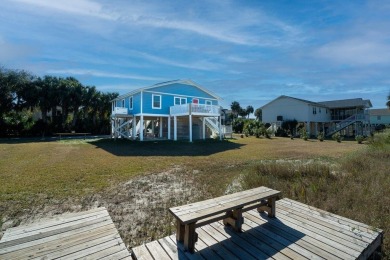 Meticulously maintained Edisto cottage fronting on a saltwater on The Plantation Course At Edisto in South Carolina - for sale on GolfHomes.com, golf home, golf lot