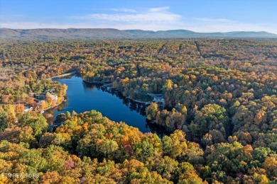 Nestled on a peaceful lakeside lot in the vibrant Fairfield on Druid Hills Golf Club in Tennessee - for sale on GolfHomes.com, golf home, golf lot