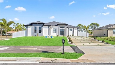 Welcome to your dream home! Nestled on a spacious lot,in front on Burnt Store Golf Club in Florida - for sale on GolfHomes.com, golf home, golf lot