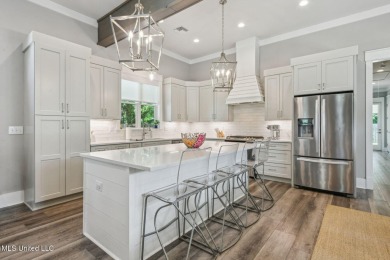 Gorgeous 3 bedroom/ 2 bath home in Old Town Bay St Louis! Within on The Bridges Golf Club At Hollywood Casino in Mississippi - for sale on GolfHomes.com, golf home, golf lot