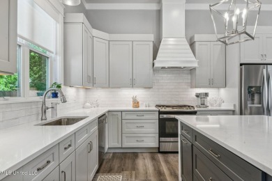 Gorgeous 3 bedroom/ 2 bath home in Old Town Bay St Louis! Within on The Bridges Golf Club At Hollywood Casino in Mississippi - for sale on GolfHomes.com, golf home, golf lot