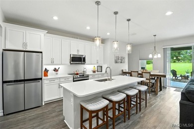 Step inside this stunning home that offers the space, luxury on Citrus Hills Golf Club in Florida - for sale on GolfHomes.com, golf home, golf lot