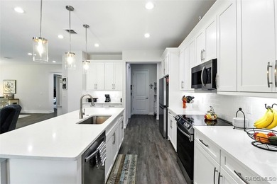 Step inside this stunning home that offers the space, luxury on Citrus Hills Golf Club in Florida - for sale on GolfHomes.com, golf home, golf lot