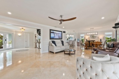 Stunning waterfront top-down remodel in the sought-after Yacht & on Yacht and Country Club in Florida - for sale on GolfHomes.com, golf home, golf lot