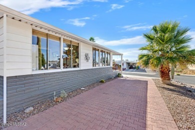 Beautiful home with updates galore! Larger kitchen with Corian on Tucson Estates Golf Course in Arizona - for sale on GolfHomes.com, golf home, golf lot