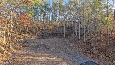 Location truly matters... and this one delivers. Positioned just on Gatlinburg Golf Course in Tennessee - for sale on GolfHomes.com, golf home, golf lot