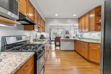 Welcome to this exceptional two-story end unit, perfectly on Poplar Creek Country Club in Illinois - for sale on GolfHomes.com, golf home, golf lot